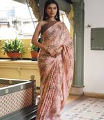 Peach chiffon floral print saree with unstitched blouse piece