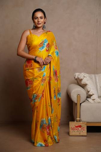 Mustard yellow chiffon floral print saree with unstitched blouse piece