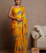 Mustard yellow chiffon floral print saree with unstitched blouse piece