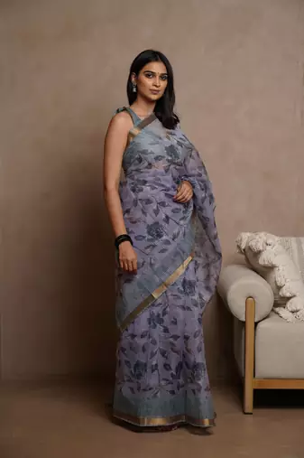 Lavender kota doria polyester floral print golden zari border saree