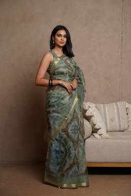 Dusty green kota doria polyester shibori print golden zari border saree 2