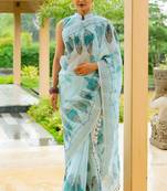 Light turquoise cotton blend digital leaf print silver zari border tassels saree