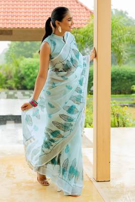 Light turquoise cotton blend digital leaf print silver zari border tassels saree 3