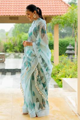Light turquoise cotton blend digital leaf print silver zari border tassels saree 4