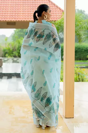 Light turquoise cotton blend digital leaf print silver zari border tassels saree