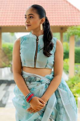 Light turquoise cotton blend digital leaf print silver zari border tassels saree 6