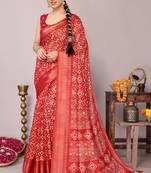 Red cotton blend ikkat patola print zari woven border saree