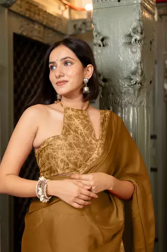 Dark mehandi chiffon floral printed saree with unstitched blouse piece