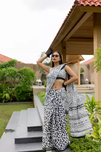 White poly cotton floral print satin stripes zari border saree