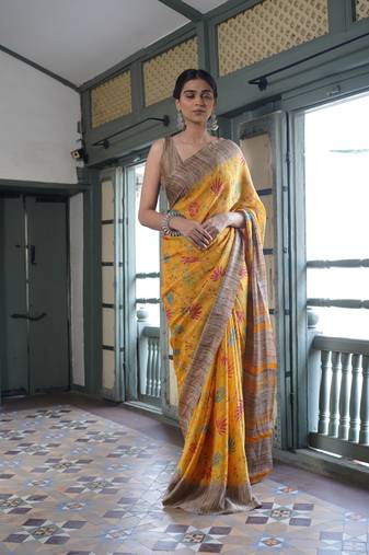 Mustard yellow chiffon floral printed saree with unstitched blouse piece