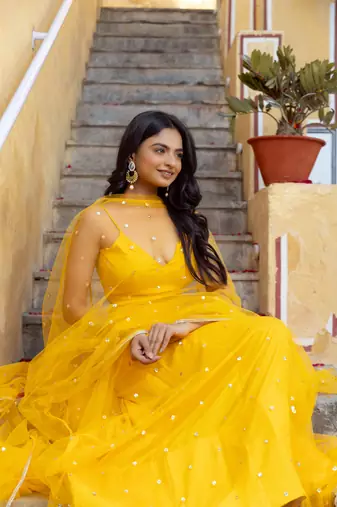 yellow  Embroidered Net lehenga choli