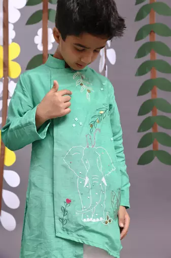 Beautiful tropical embroidered green kurta with pyjama