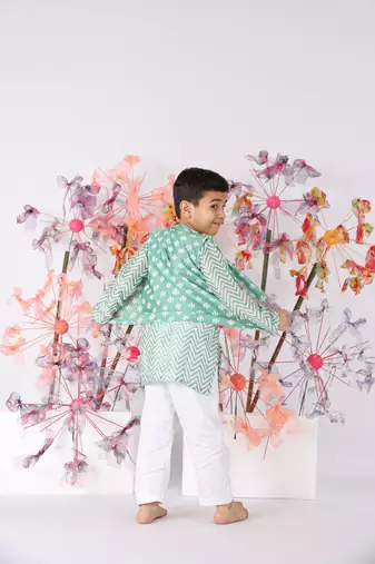 Green chanderi chevron print kurta with embroidered green jacket and white pyjama