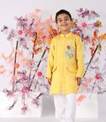 Hand embroidered achkan with yellow balloons and white pyjama