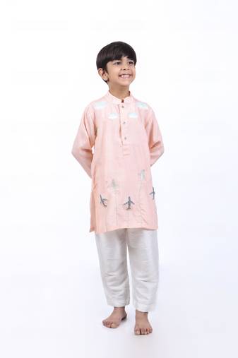 Pink kurta with airplanes and clouds with white pyjama