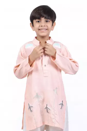 Pink kurta with airplanes and clouds with white pyjama