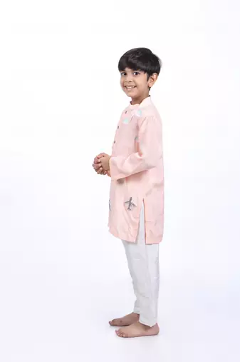Pink kurta with airplanes and clouds with white pyjama