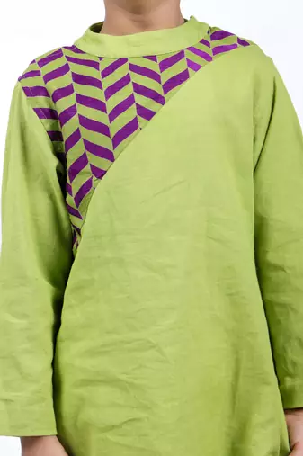 Green kurta with purple and green printed yolk with white pyjama
