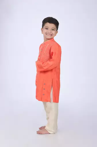 Orange kurta with abstract embroidery and off white pyjama