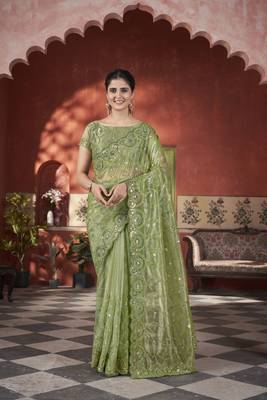 Green tissue net c sequins work saree 1
