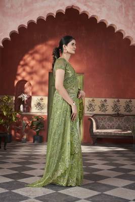 Green tissue net c sequins work saree 6