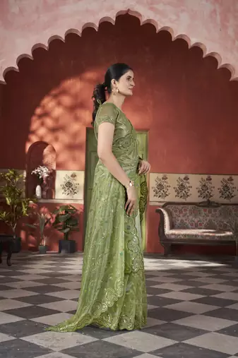 Green tissue net c sequins work saree