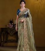Green rich indian heavy work wedding wear glamorous saree