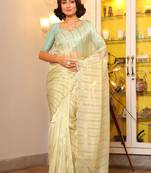 Yellow organza c partywear sequins work arco cut work saree