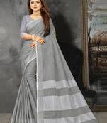 Grey linen c woven designer partywear saree