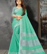 Sea green linen c woven designer partywear saree