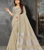 Beige linen c woven designer partywear saree