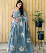 Green linen c floral printed girlie looks saree