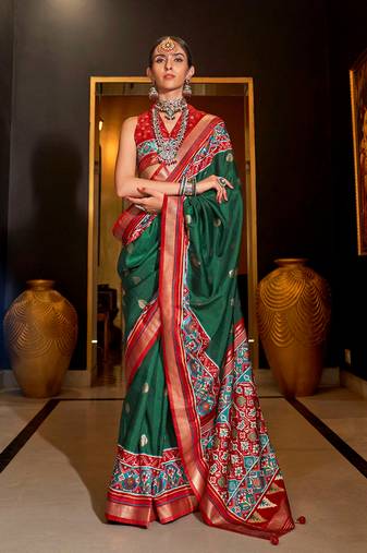 Dark green patola printed silk blend saree