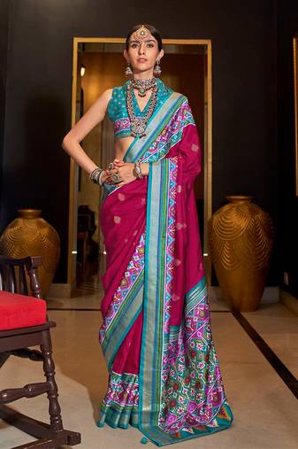 Rani pink color patola printed silk blend saree