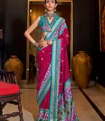 Rani pink color patola printed silk blend saree