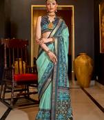 Sea green patola printed silk blend saree