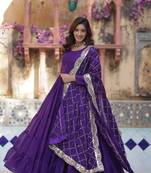 Purple georgette solid ruffle flared gown with heavy dupatta