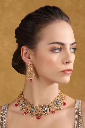 Antique gold-plated temple necklace set with kundan and pearl beads