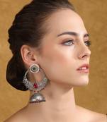 Oxidized silver-plated jhumka earrings with red & green beads