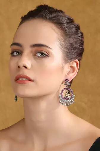Antique silver-plated swan motif earrings with pink stones