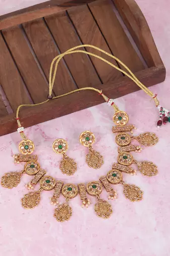 Oxidized gold-plated necklace set with intricate detailing