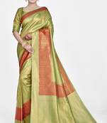 Green woven soft silk blend saree with blouse