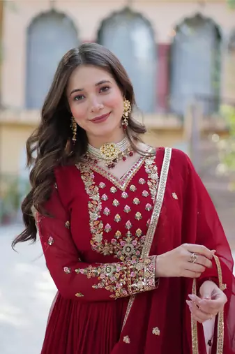 Maroon georgette sequins embroidered falred gown with heavy dupatta