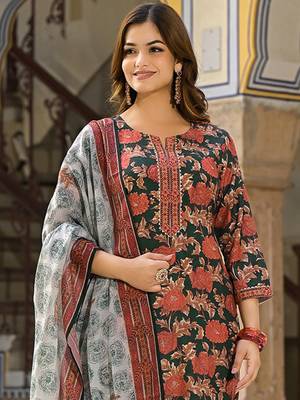 Women green rayon blend floral printed straight kurta trousers with dupatta 1
