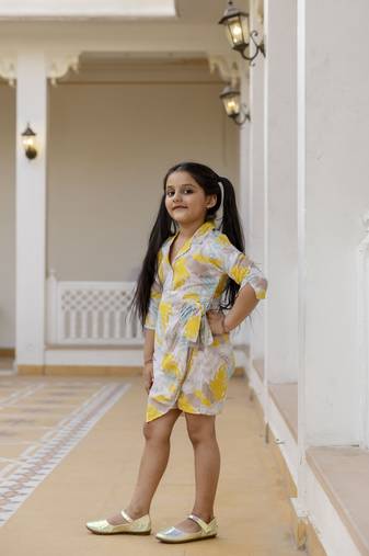 Cutiediva Girls floral printed jumpsuit in yellow
