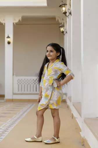 Cutiediva Girls floral printed jumpsuit in yellow