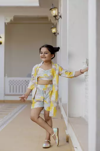 Cutiediva Girls printed sleeveless crop top and shorts with shrug co-ords in yellow ( Wedding, Daily Wear, Parties )