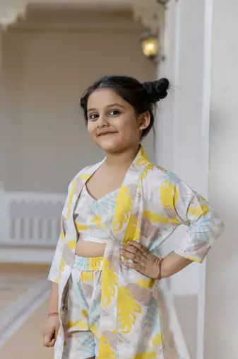 Cutiediva Girls printed sleeveless crop top and shorts with shrug co-ords in yellow ( Wedding, Daily Wear, Parties )