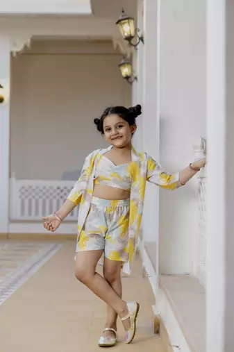 Cutiediva Girls printed sleeveless crop top and shorts with shrug co-ords in yellow ( Wedding, Daily Wear, Parties )