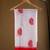 White lychee silk saree with red motifs & border